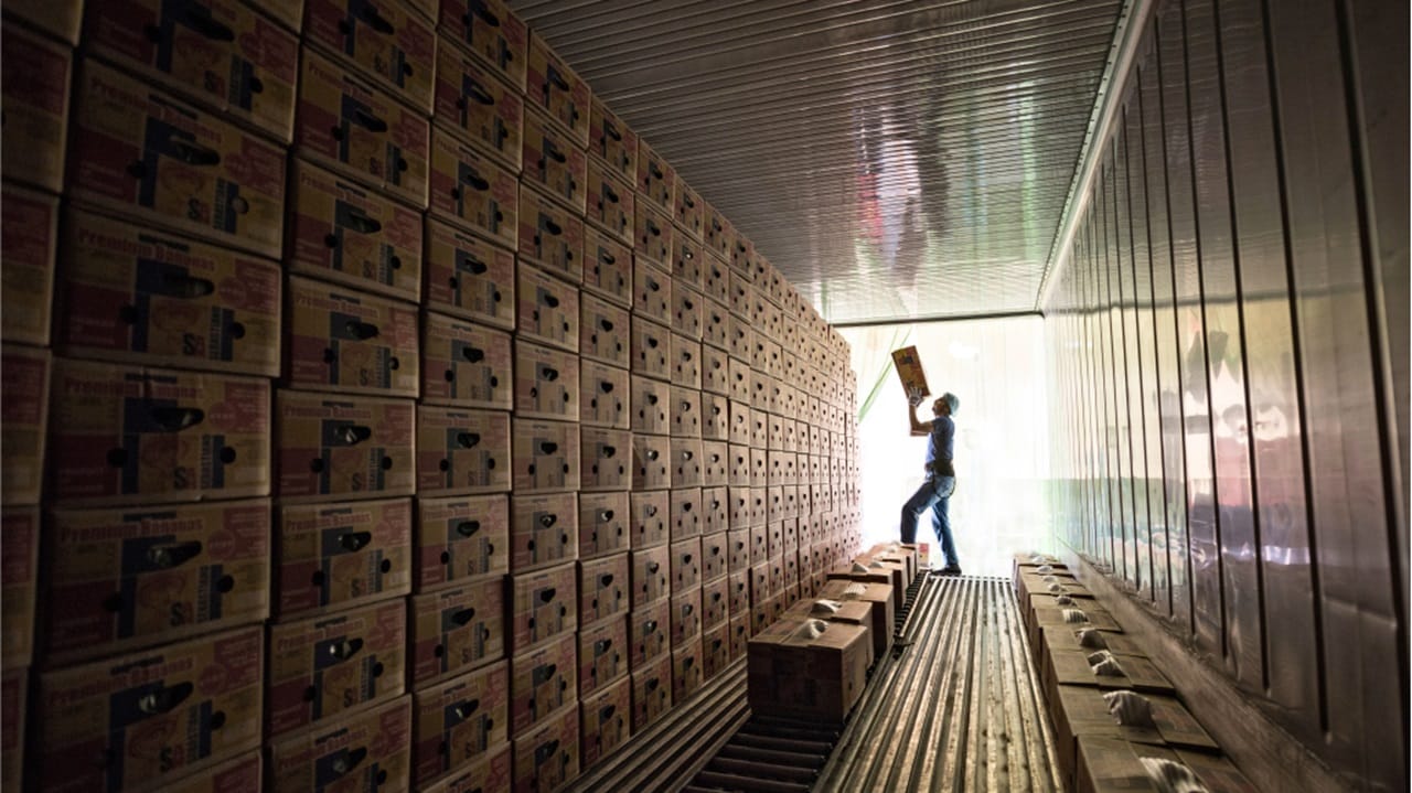 Silhouette of a male in a warehouse