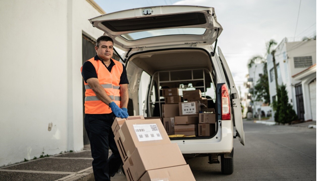 Person holding boxes