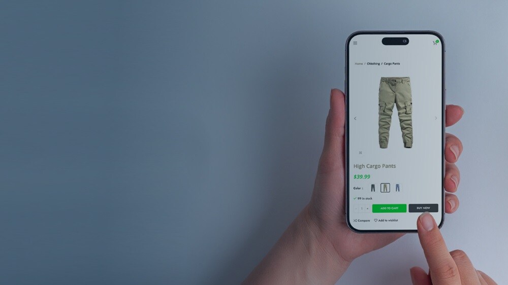 Close of a set of hands using a mobile phone