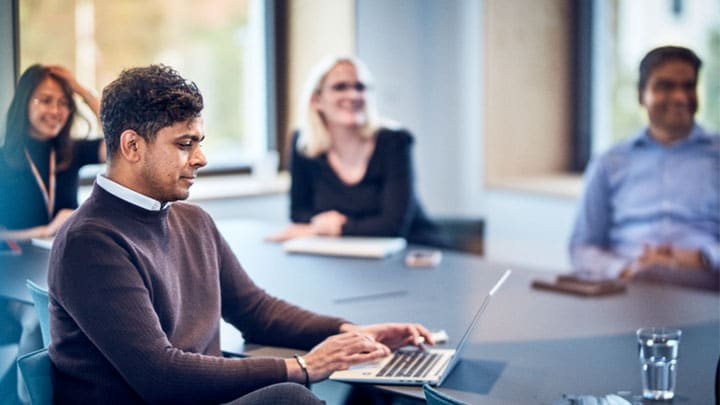 Maersk employee with laptop