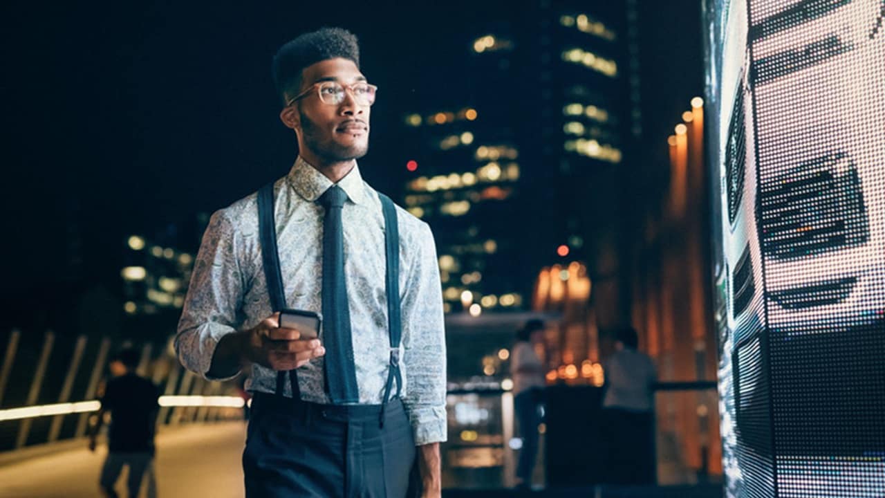 Young professional man with cell phone