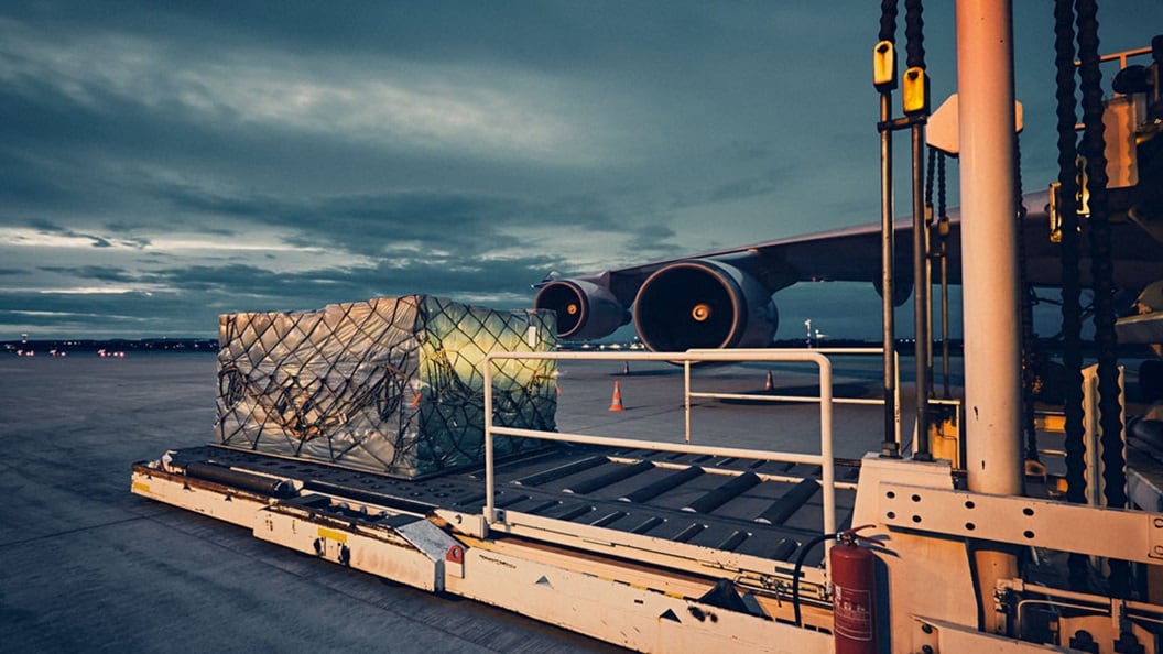 Cargo ready to be loaded onto cargo aircraft at airport.