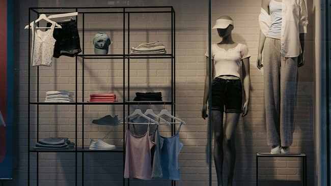 Leisurewear clothes in a shop window.