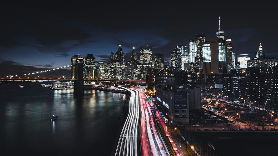 Concrete buildings at night time