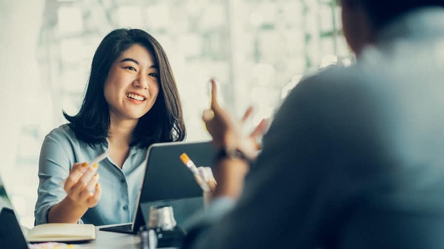 Employees having a meeting