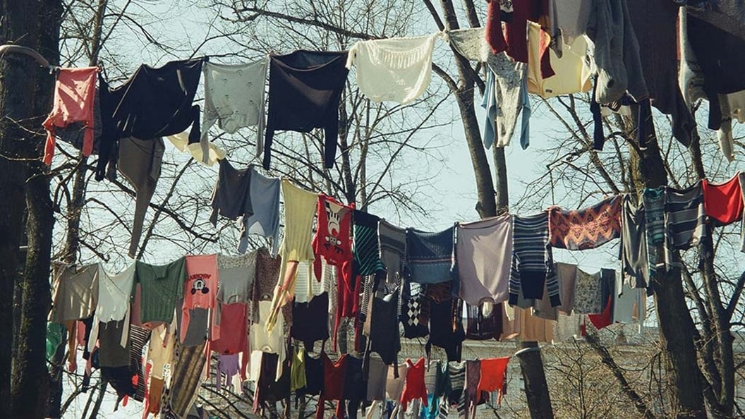 Clothes hanging from trees.