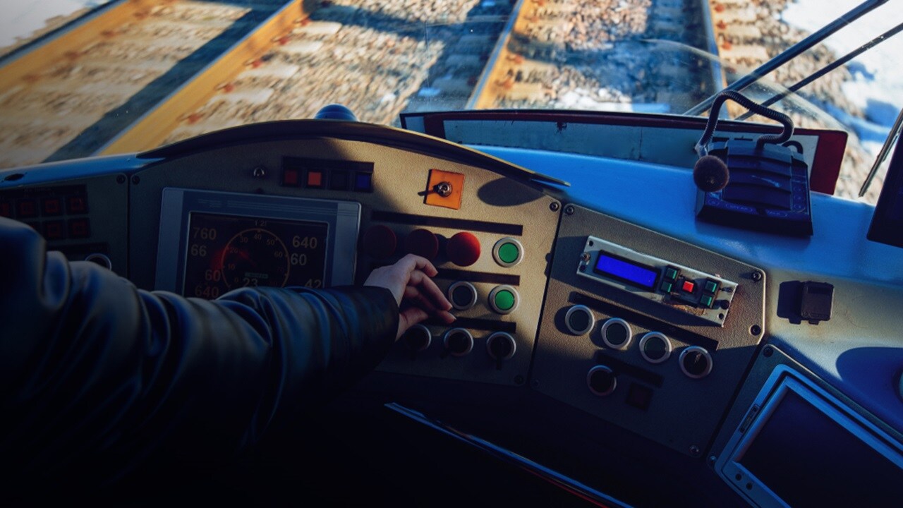 Close up shot of a hand in the cockpit of a plane