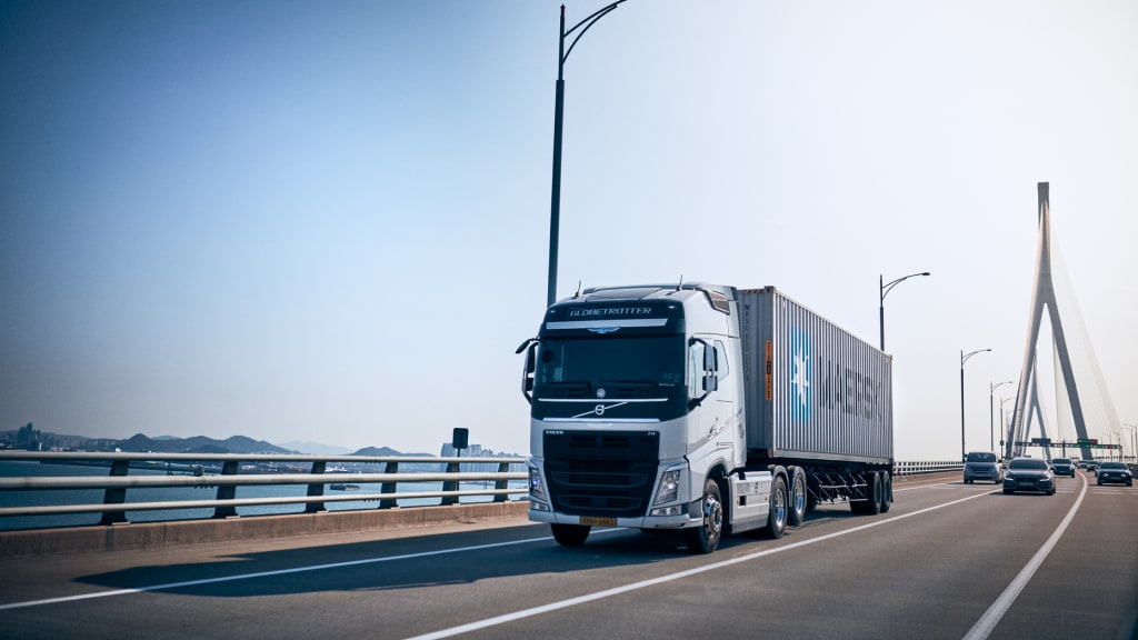 A truck with a Maersk container carrying road cargo.