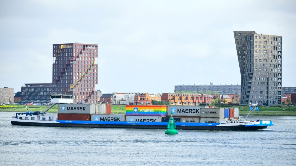 An aerial view of a Maersk ship carrying inland cargo containers.