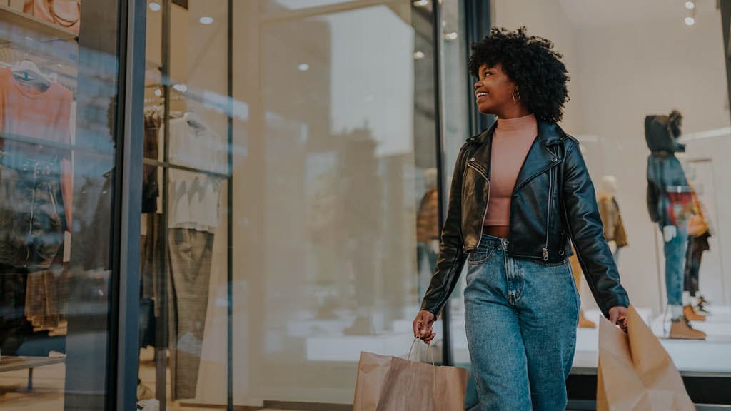 A woman carrying shopping bags