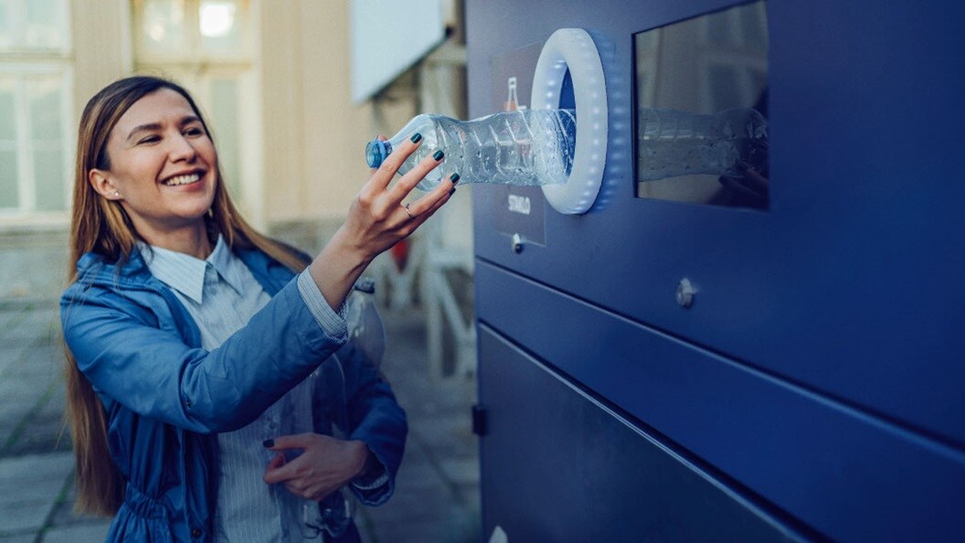 Female recycling plastic bottle 