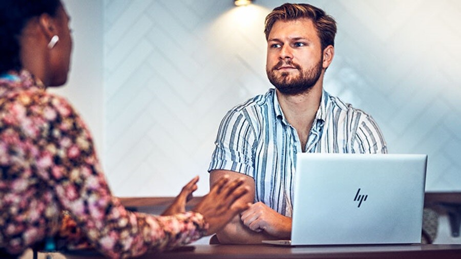 Man and woman at laptop