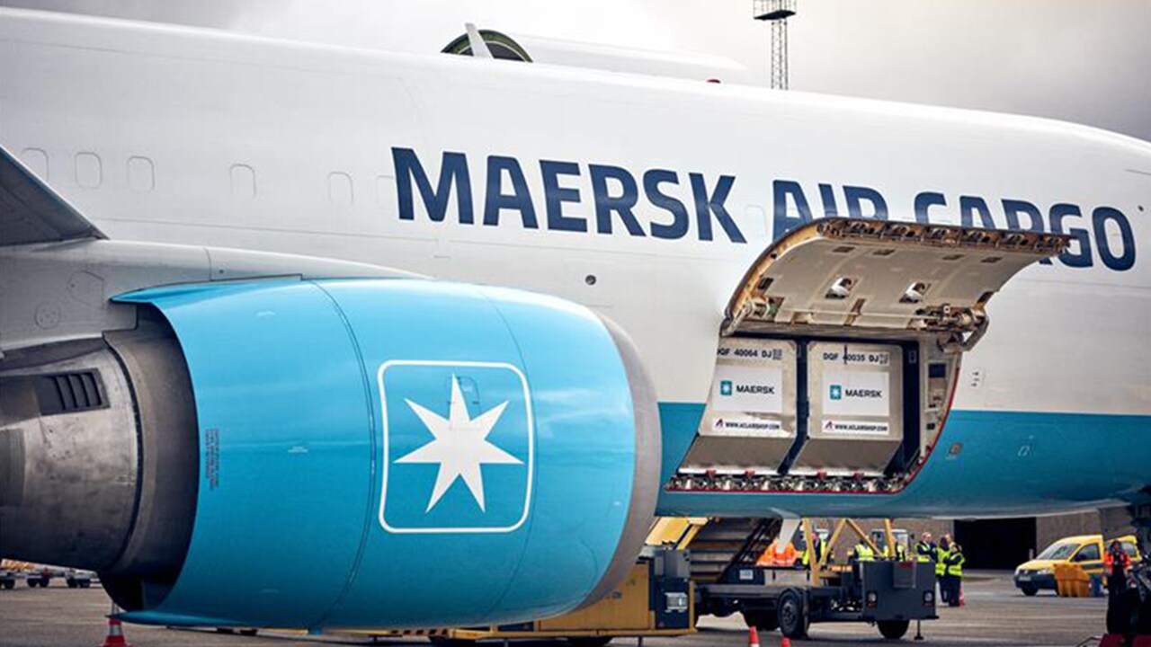 Maersk Air Cargo Boeing 767 at Billund airport getting loaded with cargo.