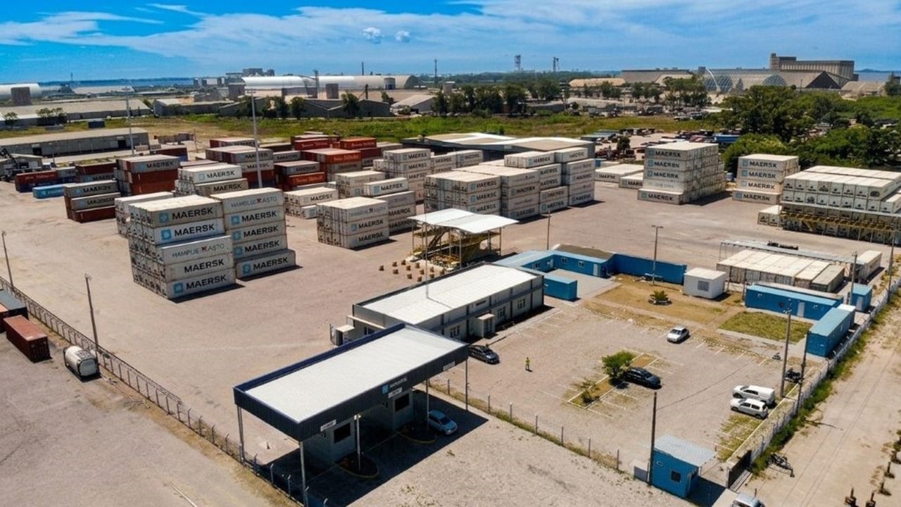 Maersk container depot in Brazil showing stacked containers, service buildings, and logistics yard infrastructure