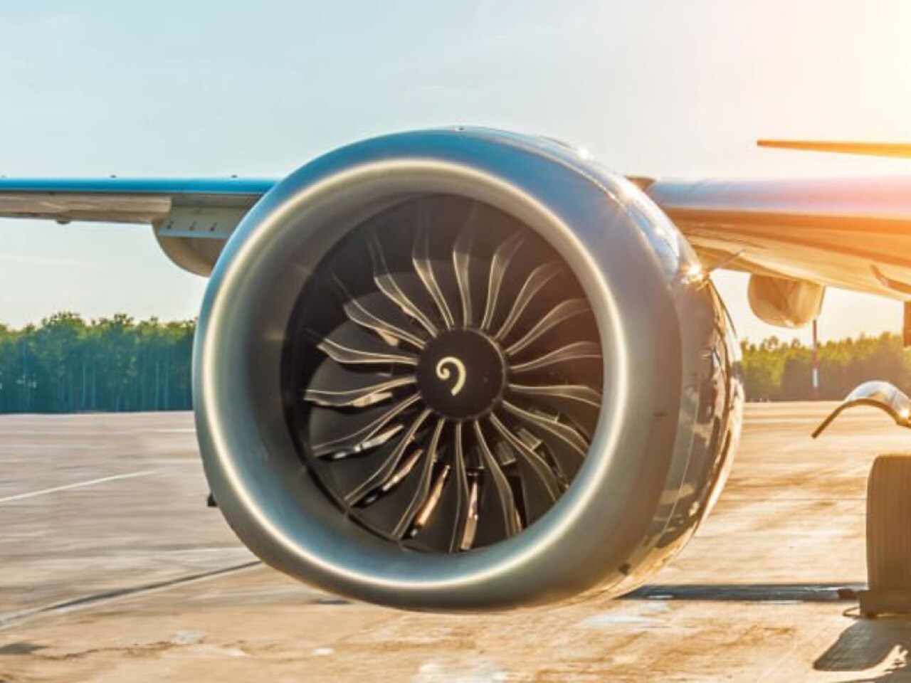 Close-up of a turbofan engine of a parked aeroplane.