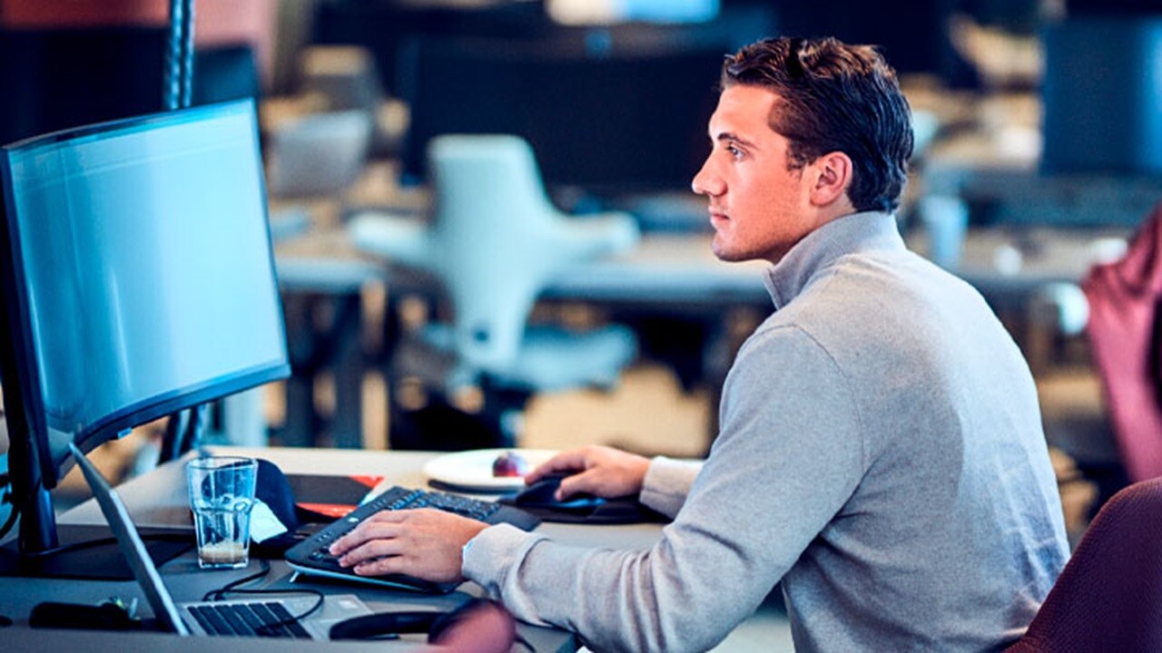 man using workstation